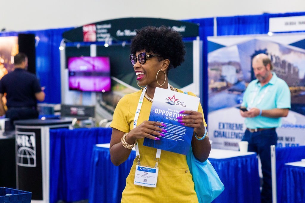 attendee collecting materials at a Washington DC trade show