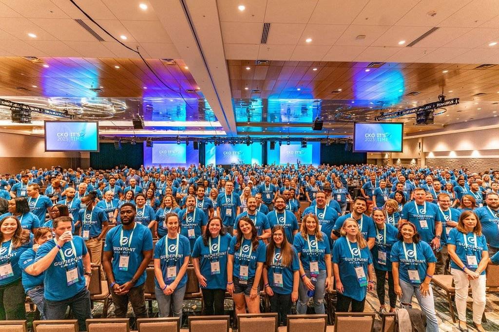 large corporate audience seated in a Washington DC auditorium