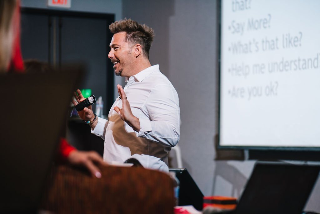 presenter speaking to a workshop audience in Washington DC